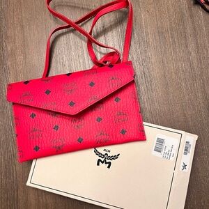 MCM authentic red envelope crossbody with Black Accents🎄Perfect for Xmas!